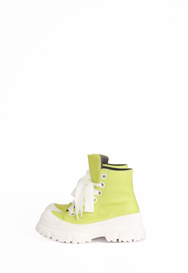 Bootie with a chunky white sole and laces