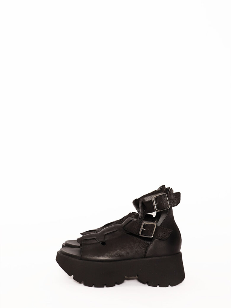 Sandal with a micro sole, zipper and buckles