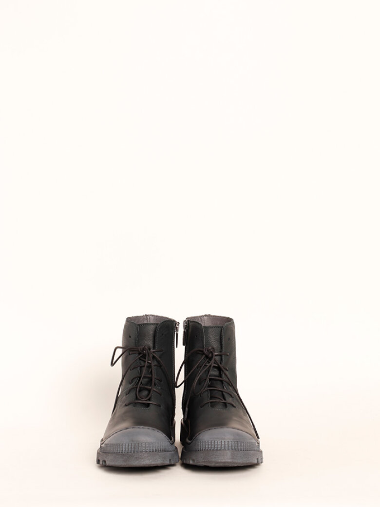 Boot with rubber sole and shoe lace