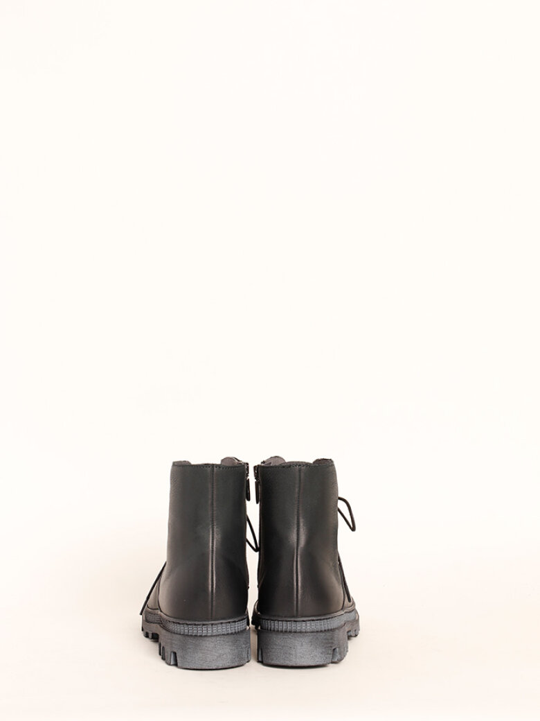 Boot with rubber sole and shoe lace