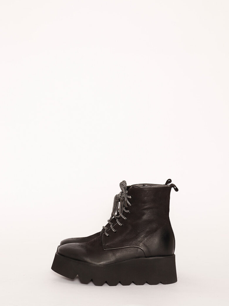 Boot with rubber sole and shoe lace