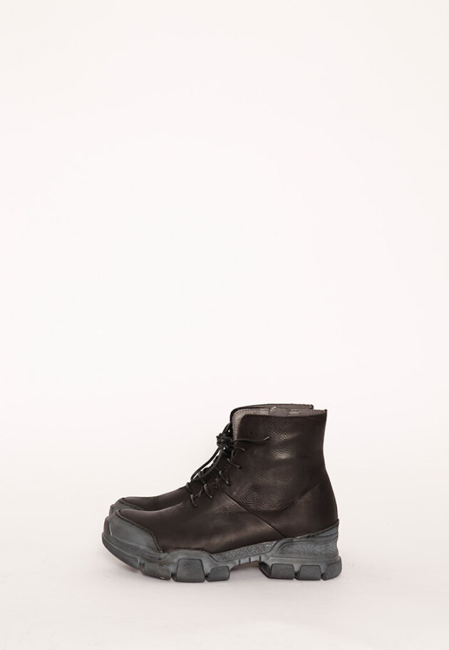 Boot with rubber sole and shoe lace