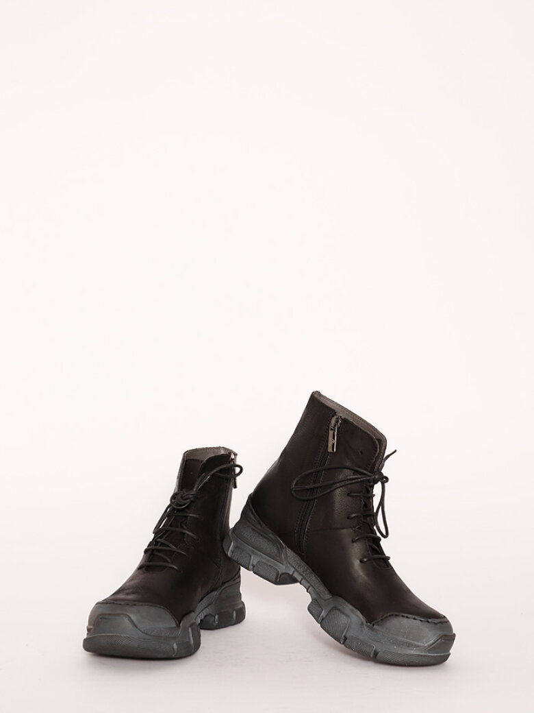 Boot with rubber sole and shoe lace