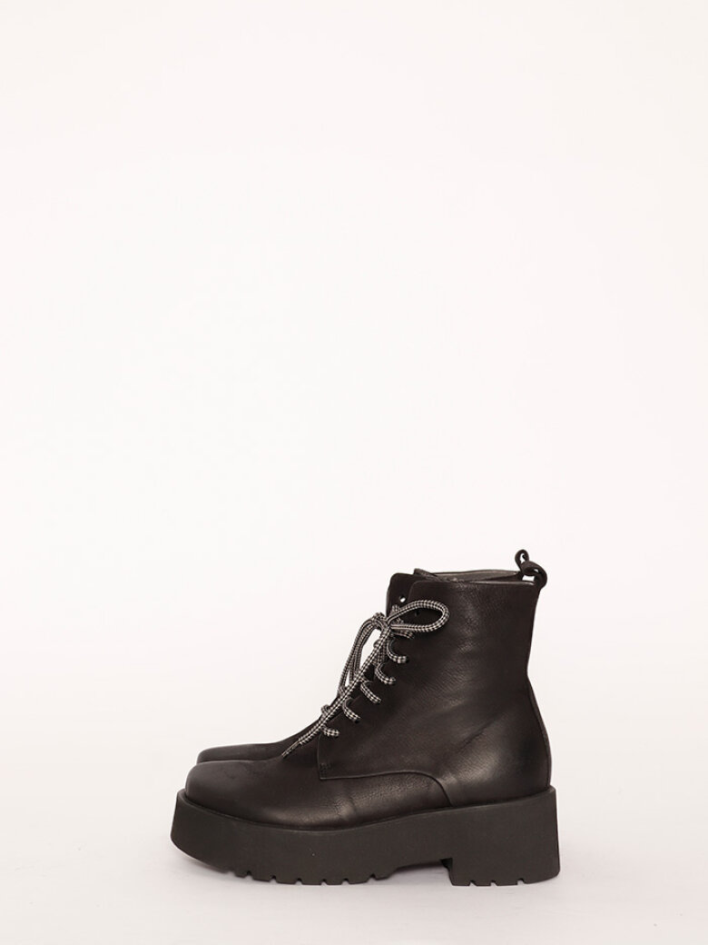 Boot with rubber sole and shoe lace