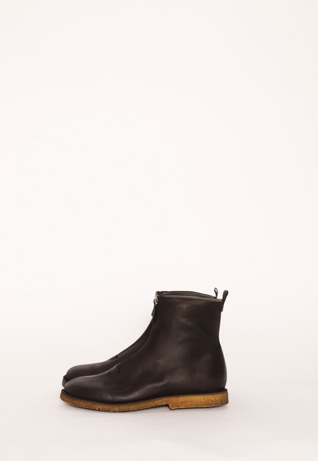 Bootie with a raw rubber sole