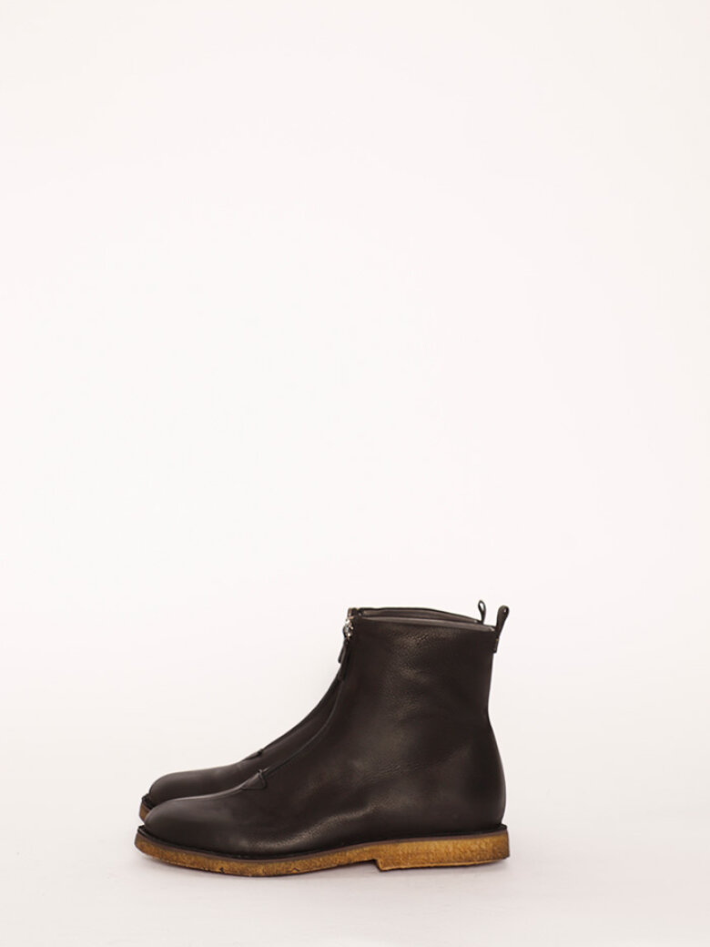 Bootie with a raw rubber sole