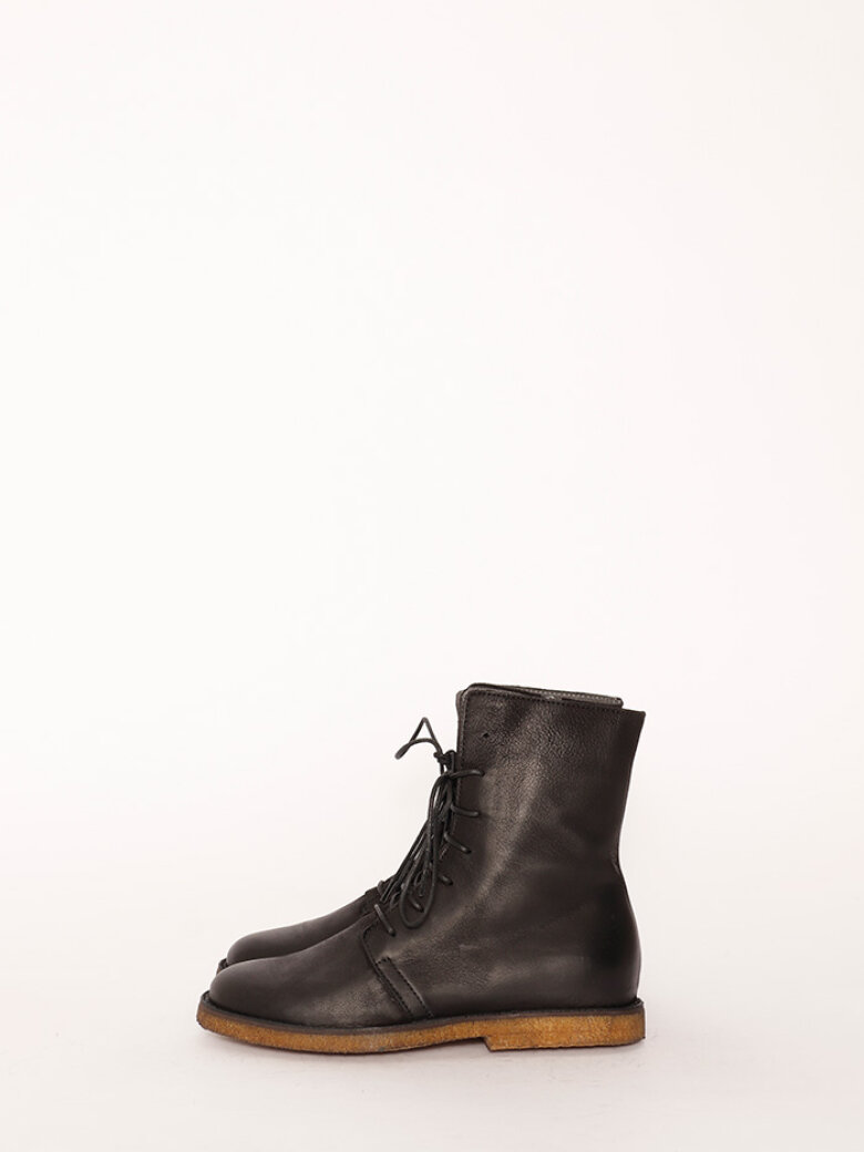 Bootie with a raw rubber sole