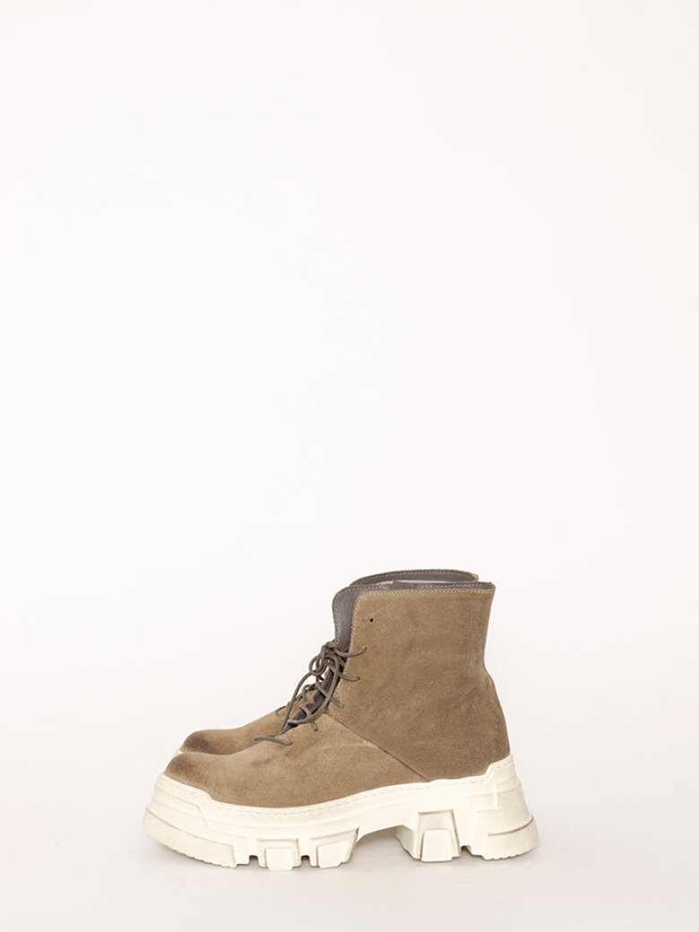 Bootie with a white chunky sole and laces